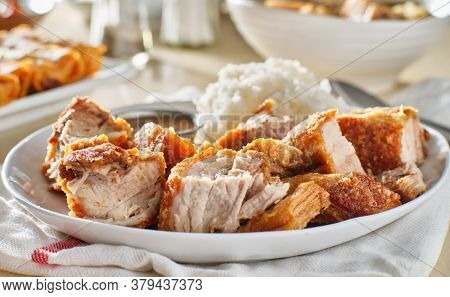 crispy filipino lechon kawali with white rice