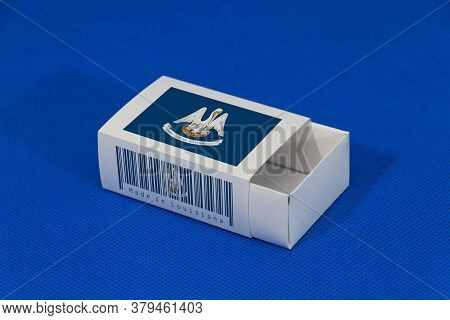Louisiana Flag On White Box With Barcode And The Color Of State Flag On Blue Background, Paper Packa