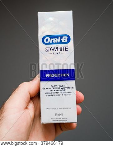 Paris, France - May 29, 2020: Square Image Of Man Hand Holding Pov New Oral-b 3d White Perfection Ne