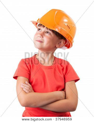 Bambina nel casco per l'edilizia