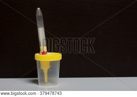 Disposable Medical Polymeric Sterile Container With A Built-in Holder For A Vacuum Test Tube With A