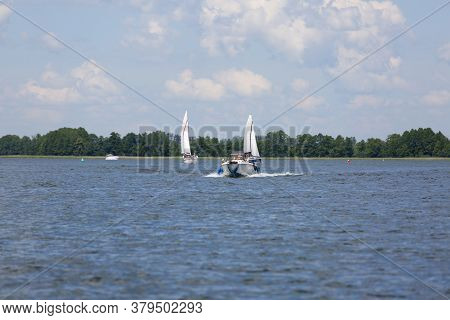 Masuria, Poland - June 24, 2020 : Lake In Polish Masuria, Sailing Yachts On A Sunny Day