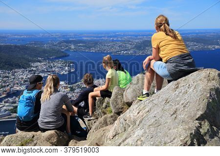 Bergen, Norway - July 23, 2020: People Enjoy The View From Ulriken Mountain Trail Overlooking City O