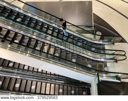 Top View Shot Of Escalator Which Have White Indicator Mark At The Stair For People To Stand With 2 M