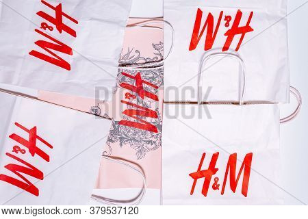 Tyumen, Russia-august 01, 2020: H And M Logo On A White Package Top View. H And M Hennes Mauritz Ab 