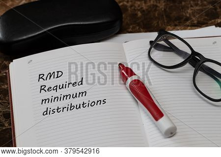 Desktop Office Desk, Notepad, Glasses, Pen And Notes With Rmd Require Minimal Distribution On The He