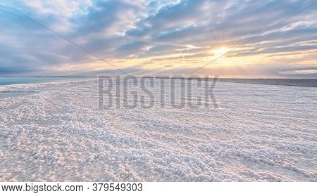 Crystalline White Salt Beach Lit By Morning Sun, Small Puddles With Seawater At Dead Sea - World Mos