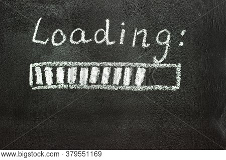 The Loading Process Is Shown In White On A Chalkboard. Stop Motion Animation.