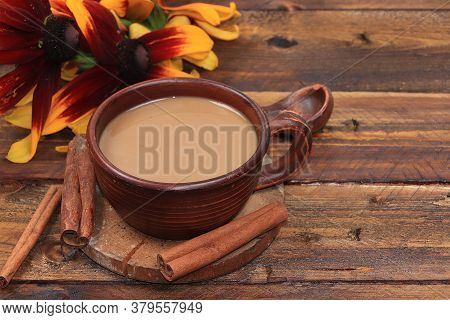 Autumn Flower Arrangement, Cup Of Coffee With Cinnamon And Flowers On A Wooden Table, Hyuge Style, C