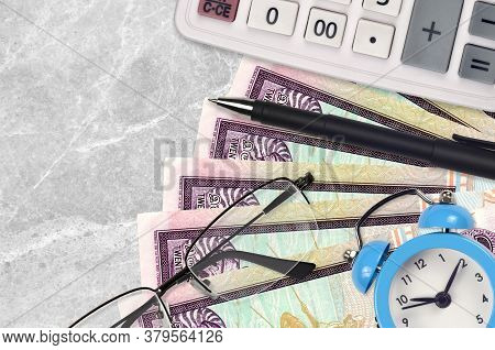 20 Sri Lankan Rupees Bills And Calculator With Glasses And Pen. Business Loan Or Tax Payment Season 