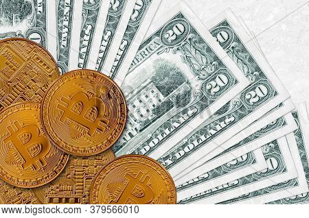 20 Us Dollars Bills And Golden Bitcoins. Cryptocurrency Investment Concept. Crypto Mining Or Trading