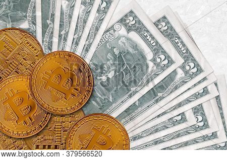2 Us Dollars Bills And Golden Bitcoins. Cryptocurrency Investment Concept. Crypto Mining Or Trading