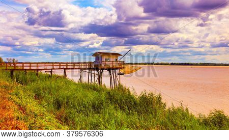 sunset on fishing hut, carrelet- atlantic ocean, France