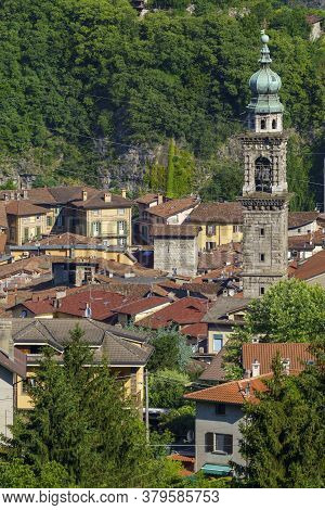 View Of Breno, Brescia, Lombardy, Italy, From The Road To Crocedomini Pass At Summer. Mountain Lands