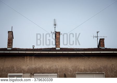Television Antennas,  Vhf And Uhf Frequencies, At The Top Of A European Roof. Vhf And Uhf Are Two Of