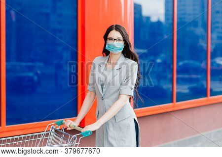 Woman In A Protective Face Mask At Public Place. Coronavirus, Covid-19 Spread Prevention Concept, Re