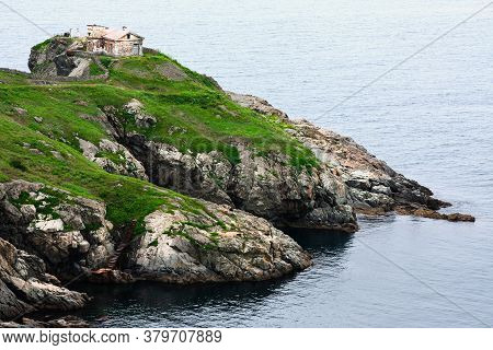 The Southernmost Point Of Russia, Huge Rocks On The Ocean, Sea Summer Landscape, Old Stone Building 