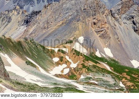 Aerial View Of The Relief Of High Altitude Mountains At The Col Du Vallon (left) Which Separate The 
