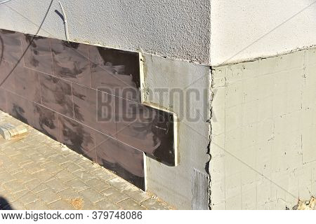Insulation Of Walls Cladding A Ceramic Tile. Modern Metal Facade Tiles To Repair And Restore Front S