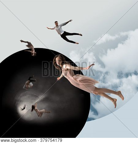Mid-air Beauty Cought In Moment. Full Length Shot Of Attractive Young Woman And Man Hovering In Air 