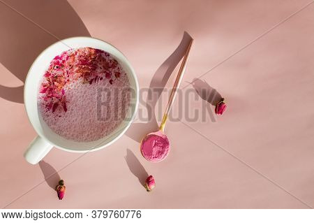 Cup Of Rose Cardamom Ayuverdic Drink On Pink Background.