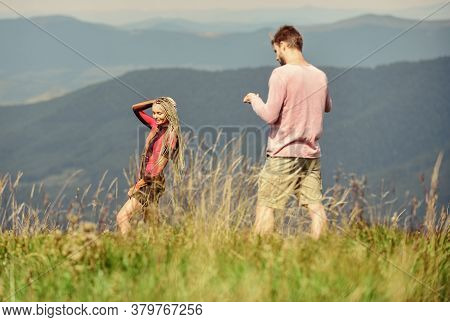 Snapping Memories. Man And Woman Posing Mobile Photo. Lets Take Photo. Summer Vacation Concept. One 