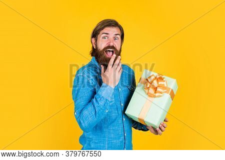 Making Purchases At Store. Buy Anniversary Gifts. Surprised Male Open Box With Something Exciting In