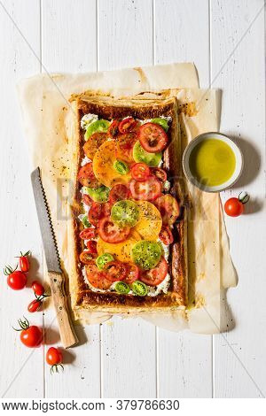 Puff Pastry, Herbed Cream Cheese And Sliced Fresh Tomato Tart, Copy Space For Your Text