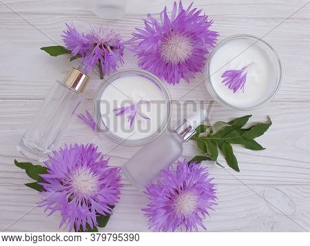 Cream Cosmetic Flower On Wooden Background Mask