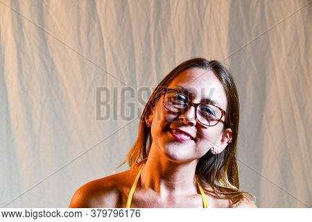 Young Lady With Mutli-colored Stylish Eyeglasses On White Background