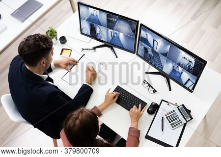 Cctv Footage Security Control Operators Watching Surveillance Footage On Computer