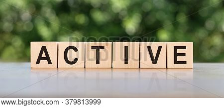 Active Word Letters On Wood Block. Message Text On Wooden Table For Backdrop Design.