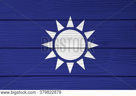Kuomintang Flag Color Painted On Fiber Cement Sheet Wall Background. A White Sun With Twelve Rays On