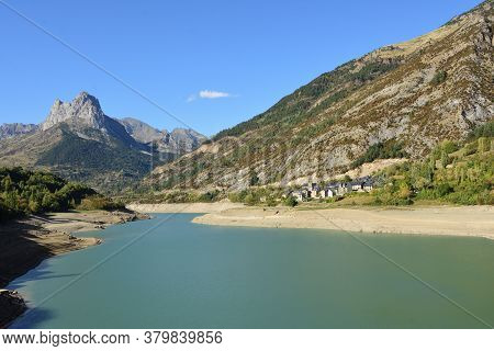 View Of The Bubal Dam And The Village Of Hoz In Jaca, Huesca Province, Aragon, Spain