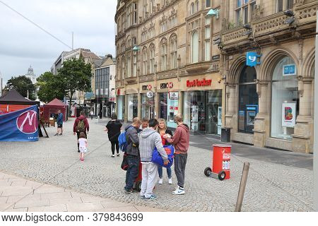 Sheffield, Uk - July 10, 2016: People Visit Fargate Shopping Area In Sheffield, Yorkshire, Uk. Sheff