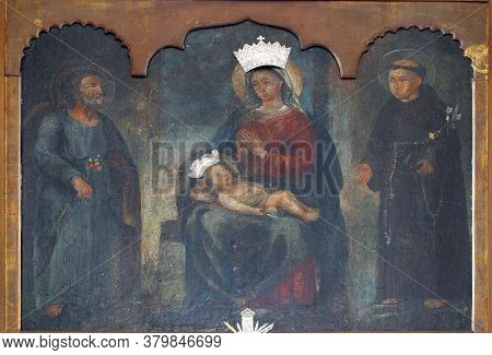 NOVALJA, CROATIA - SEPTEMBER 29, 2013: Virgin Mary with child Jesus surrounded by St. Joseph and St. Anthony of Padua, altarpiece at St. Mary's Church in Novalja, Croatia