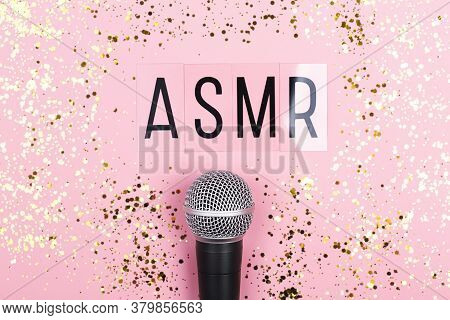 A Microphone And Letters Asmr On Pink Background. Minimal Compostion.