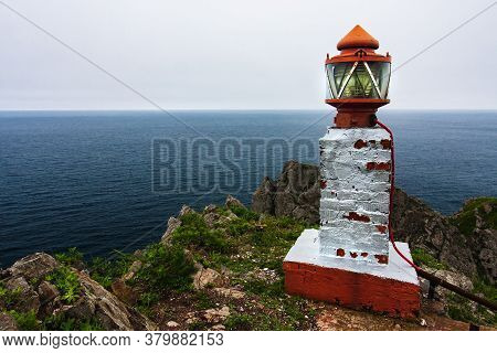 Lighthouse, Huge Rocks On The Ocean, Sea Summer Landscape, Old Stone Building On A High Cliff, Gamov