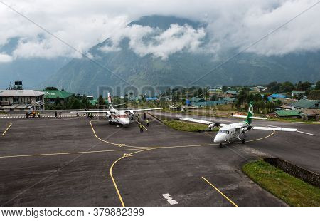 Lukla, Nepal : September-29-2018 : The Aircraft Landing On The Runway Of Tenzing-hillary Airport, Th