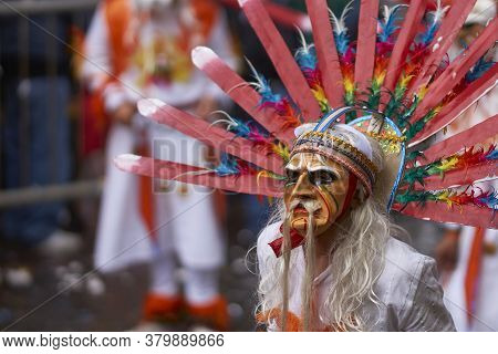 Oruro, Bolivia - February 25, 2017: Tobas Dancers In Colourful Costumes Performing At The Annual Oru