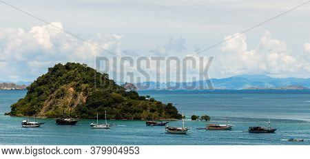 Palua Pungua Besar Island And Boats Near Labuan Bajo, During The Day, Flores, Indonesia
