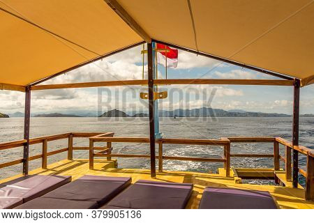 A View Of The Flores Coastline From The Upstairs Of A Liveaboard, On A Sunny Day In Indonesia