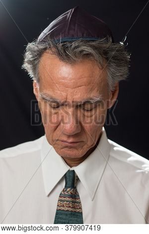 Jewish Man Rabbi, Praying While Wearing His Yamaka