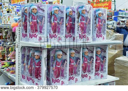 Russia, St. Petersburg, 20,12,2014 Dolls In The Package On The Supermarket Shelf