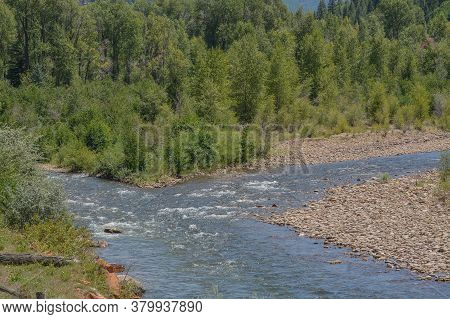 The Dolores River Winding Through The San Juan National Forest. Dolores, Colorado