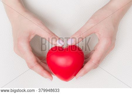 Red Heart. Healthcare And Medicine Concept. Woman Holding Decorative Heart. Close-up Of Female Hands