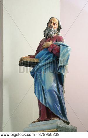 BRDOVEC CROATIA - SEPTEMBER 17, 2012: St. Andrew's statue on the main altar at St. Vitus Church in Brdovec, Croatia