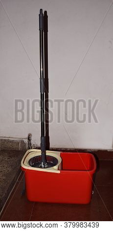 Pick & Ship Spin Bucket Mop In Display At A Home Used For Cleaning The Floor