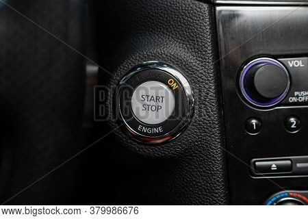 Novosibirsk/ Russia - August 01  2020: Infiniti Fx, Car Dashboard:  Black Engine Start Stop Button, 