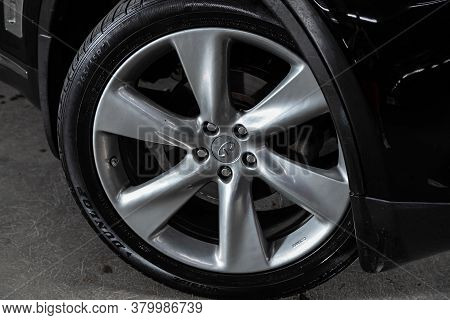 Novosibirsk/ Russia - August 01  2020: Infiniti Fx, Car Wheel On Black  Car - Close Up